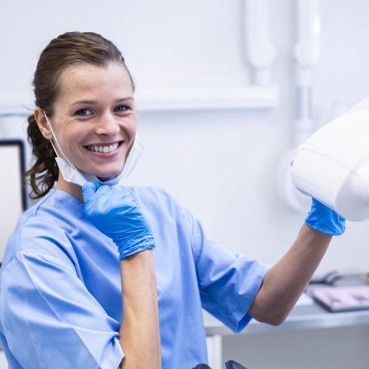 Dental hygienist smiles